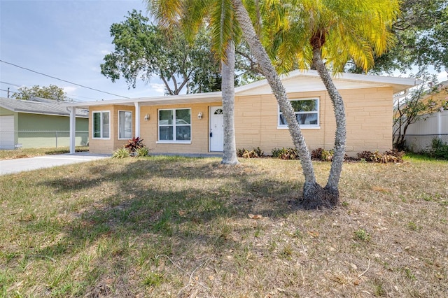 13926 Helen Ave, Hudson, FL 34667 - single story home with fence, concrete block siding, and a front yard