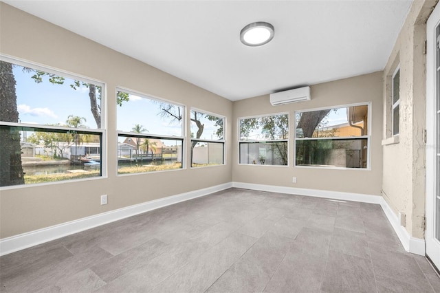 13926 Helen Ave, Hudson, FL 34667 - unfurnished sunroom with baseboards and a wall mounted AC