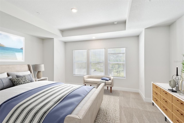 2123 1st Ave N, Saint Petersburg, FL 33713 - bedroom with light carpet, baseboards, a tray ceiling, and recessed lighting