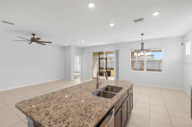 13227 Waterleaf Garden Cir, Riverview, FL 33579 - kitchen featuring hanging light fixtures, a sink, dishwasher, light tile patterned floors, and visible vents