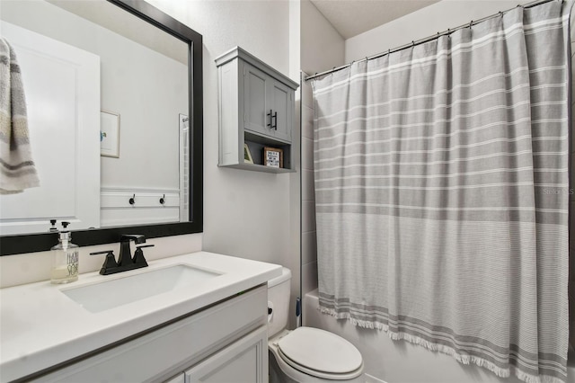 bathroom featuring vanity, toilet, and shower / bathtub combination with curtain