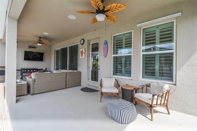 view of patio / terrace with outdoor lounge area and a ceiling fan