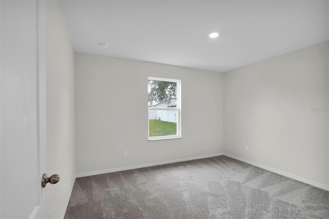 16 Rymen Ln, Palm Coast, FL 32164 - carpeted spare room featuring recessed lighting and baseboards