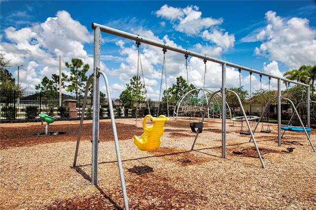 community jungle gym with fence