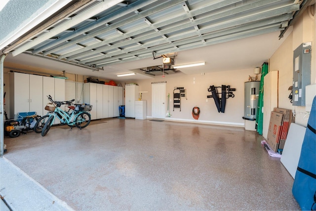 garage featuring water heater, a garage door opener, and electric panel