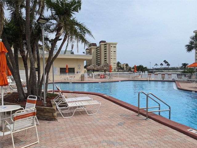 4725 Cove Cir Unit 601, Saint Petersburg, FL 33708 - community pool featuring fence and a patio area