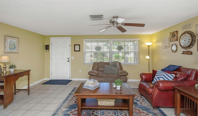 living room with visible vents, baseboards, ceiling fan, and light tile patterned flooring