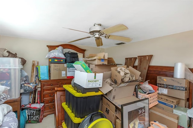 storage room with a ceiling fan and visible vents