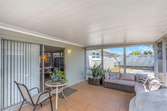 sunroom / solarium featuring an outdoor living space
