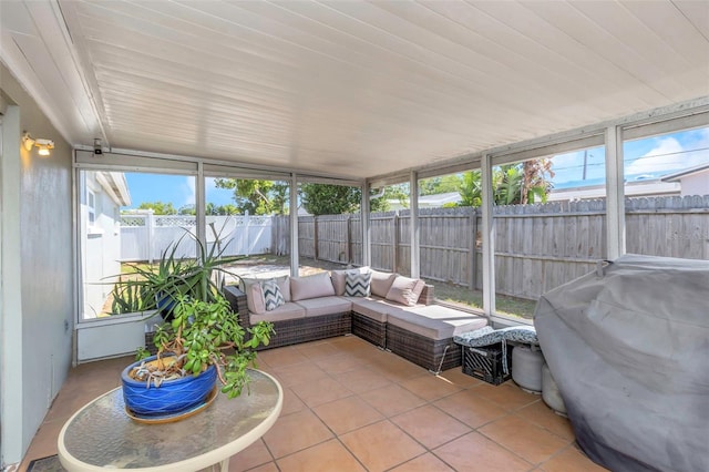sunroom / solarium with an outdoor hangout area and a wealth of natural light