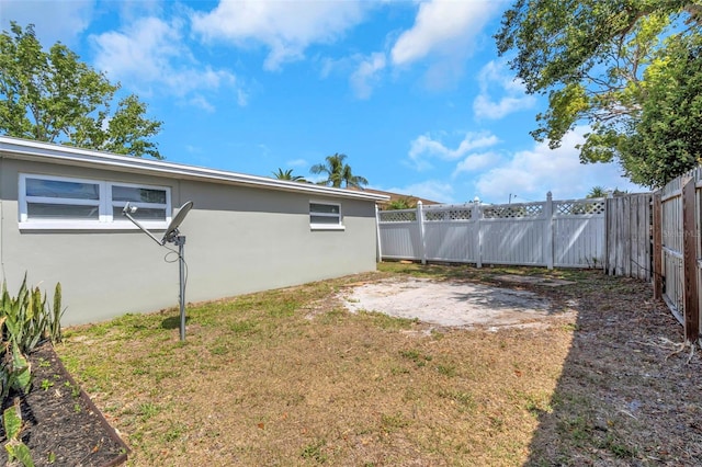 view of yard featuring a fenced backyard and a patio