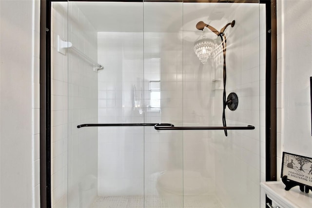 bathroom with a shower stall