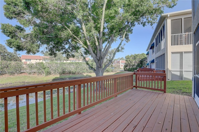 6330 99th Way N Unit 14F, Saint Petersburg, FL 33708 - wooden terrace featuring a yard