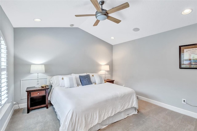 bedroom featuring baseboards, carpet, and lofted ceiling