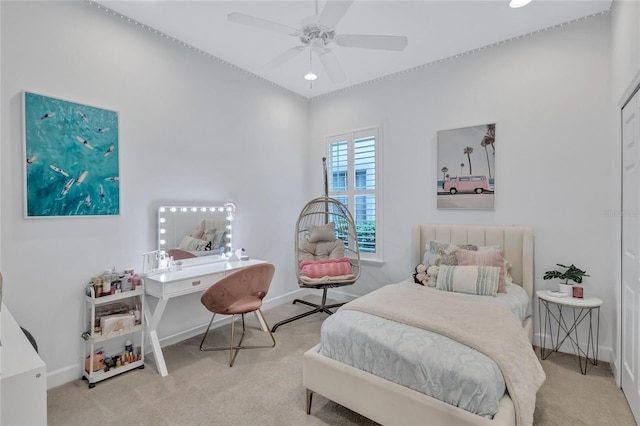carpeted bedroom featuring baseboards, a ceiling fan, and recessed lighting