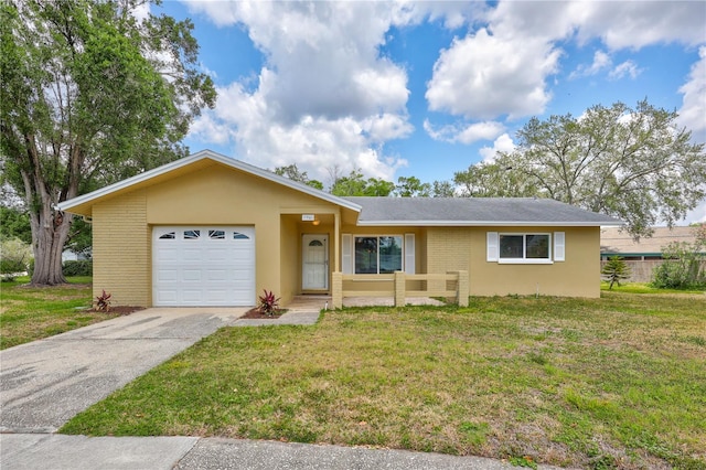 2961 Briar Cliff Dr, Palm Harbor, FL 34684 - ranch-style home with concrete driveway, brick siding, a front yard, and a garage