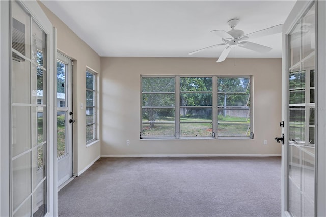 2961 Briar Cliff Dr, Palm Harbor, FL 34684 - unfurnished sunroom with french doors