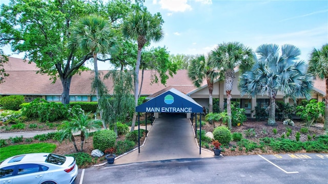 2961 Briar Cliff Dr, Palm Harbor, FL 34684 - view of building exterior with uncovered parking