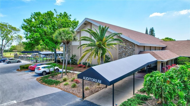 2961 Briar Cliff Dr, Palm Harbor, FL 34684 - view of building exterior featuring uncovered parking