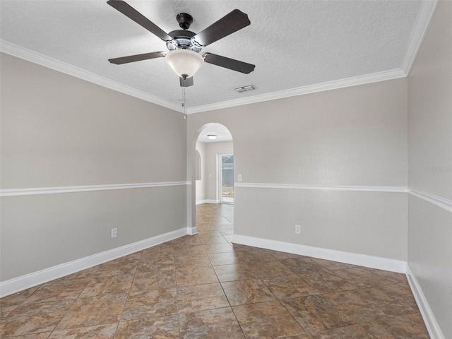 unfurnished room featuring arched walkways, a textured ceiling, a ceiling fan, baseboards, and visible vents