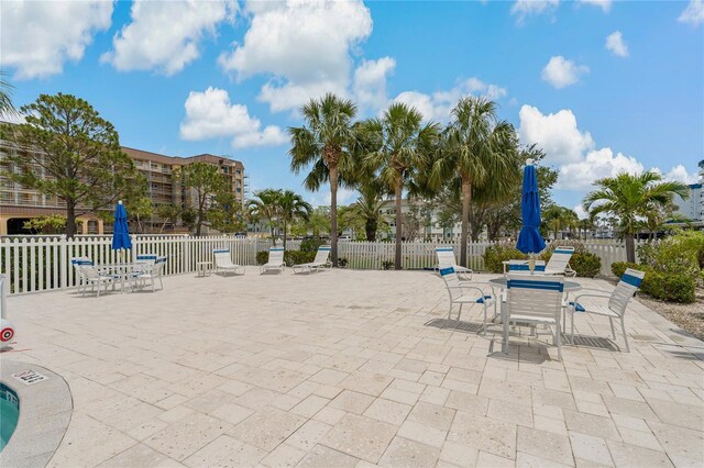 7 Island Park Pl Unit 204, Dunedin, FL 34698 - view of patio featuring outdoor dining space