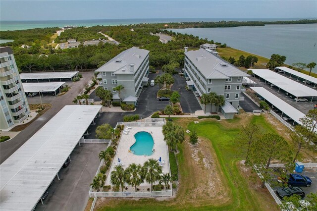 7 Island Park Pl Unit 204, Dunedin, FL 34698 - aerial view of a pool and a large body of water