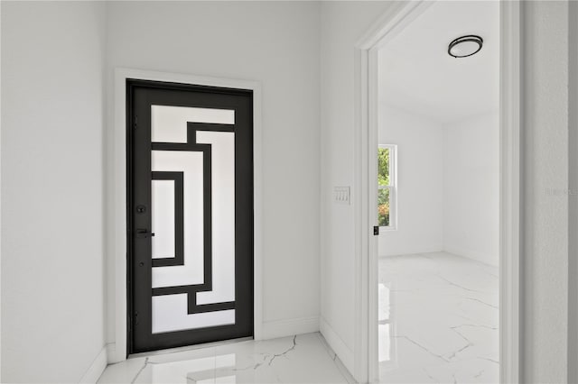 3803 E Curtis St, Tampa, FL 33610 - entryway with marble tiled floors and baseboards