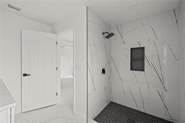 3803 E Curtis St, Tampa, FL 33610 - full bathroom featuring tiled shower and marble finish floors
