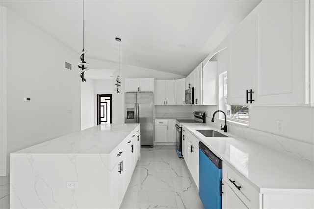3803 E Curtis St, Tampa, FL 33610 - kitchen with stainless steel appliances, a sink, a kitchen island, vaulted ceiling, and light marble finish floors