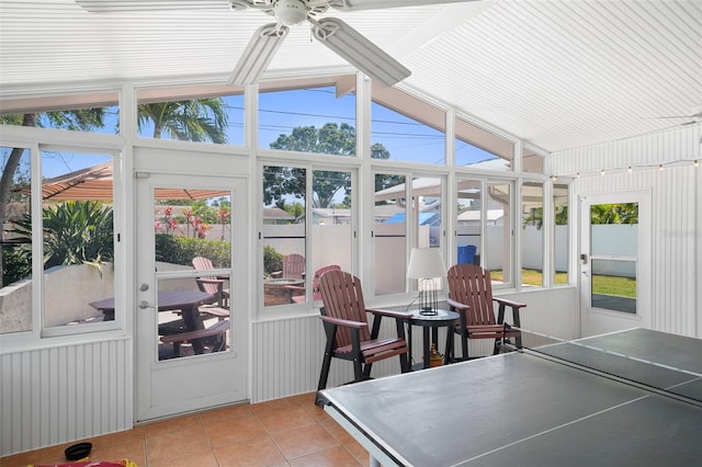 sunroom / solarium with ceiling fan and plenty of natural light
