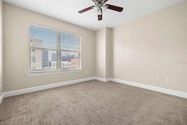 1227 E Madison St Unit 902, Tampa, FL 33602 - unfurnished room with carpet flooring, ceiling fan, and baseboards