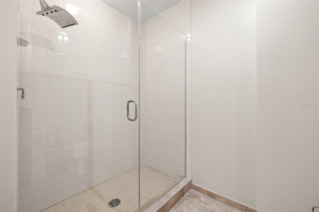 1227 E Madison St Unit 902, Tampa, FL 33602 - full bath featuring a shower stall and tile patterned floors