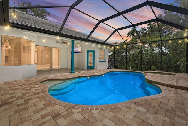 7314 Hunt Club Ln, Seminole, FL 33776 - outdoor pool with a patio area, an in-ground hot tub, ceiling fan, and a lanai