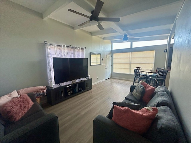living room with beam ceiling, a ceiling fan, baseboards, wood finished floors, and coffered ceiling