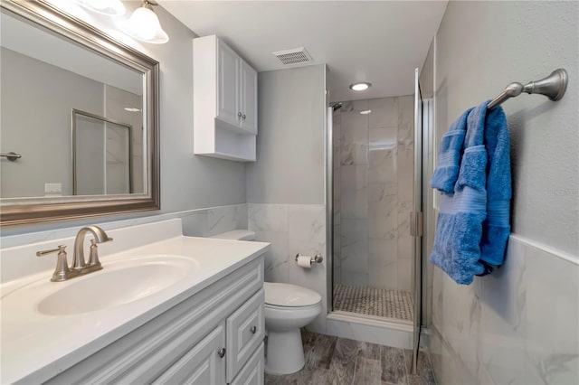 112 W Cypress Ct, Oldsmar, FL 34677 - bathroom with visible vents, a marble finish shower, toilet, and vanity