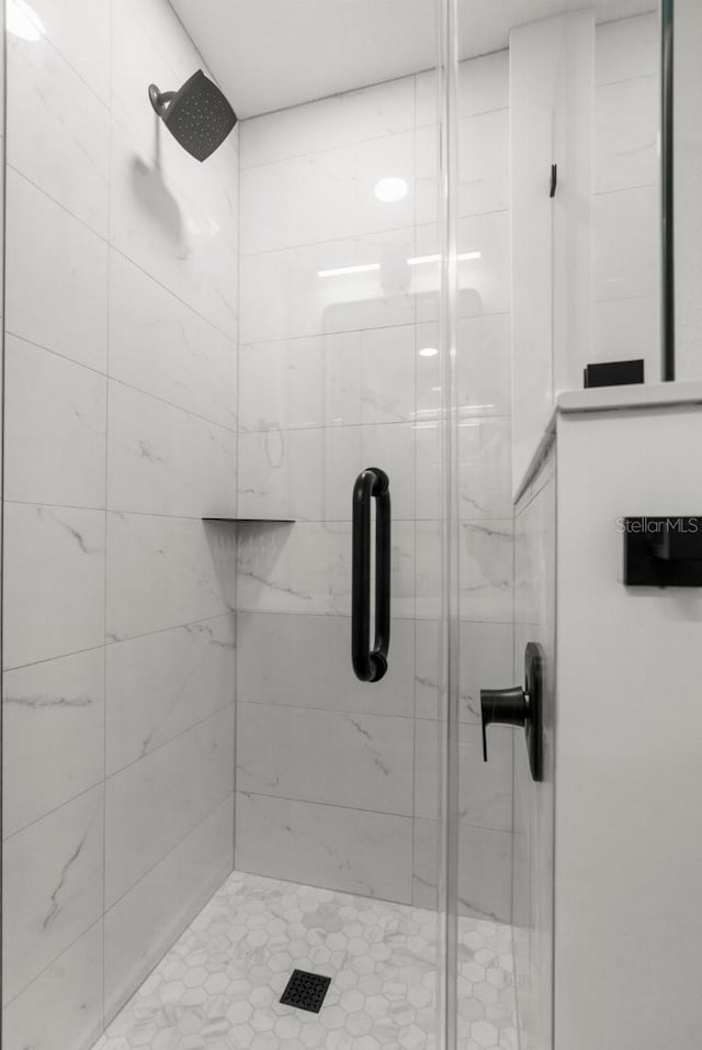 bathroom featuring a stall shower