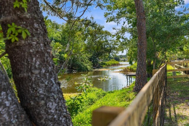 view of water feature with fence