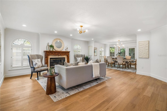 101 Ponce De Leon Blvd, Belleair, FL 33756 - living room featuring a notable chandelier, baseboards, a healthy amount of sunlight, and recessed lighting