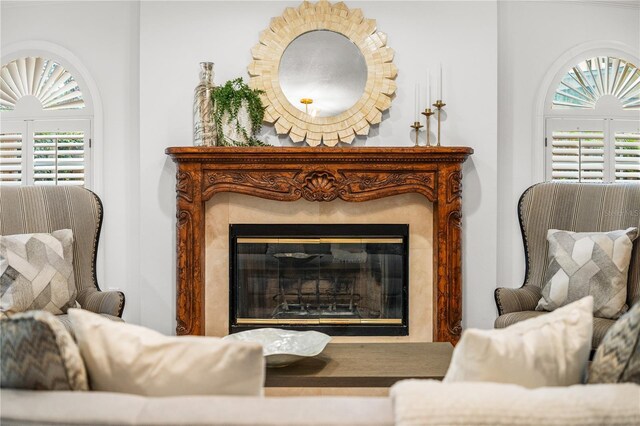 101 Ponce De Leon Blvd, Belleair, FL 33756 - living area with a glass covered fireplace and plenty of natural light