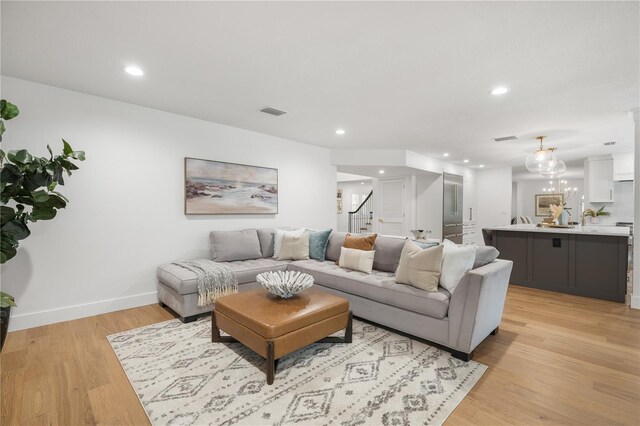 101 Ponce De Leon Blvd, Belleair, FL 33756 - living area featuring light wood-style floors, visible vents, baseboards, and recessed lighting