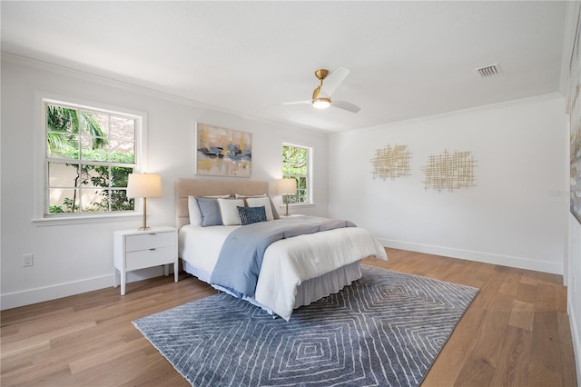 101 Ponce De Leon Blvd, Belleair, FL 33756 - bedroom featuring baseboards, ceiling fan, light wood-style flooring, and crown molding