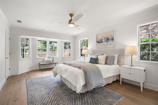 101 Ponce De Leon Blvd, Belleair, FL 33756 - bedroom with multiple windows, visible vents, and ornamental molding