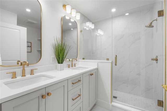 101 Ponce De Leon Blvd, Belleair, FL 33756 - full bath with a marble finish shower, recessed lighting, double vanity, and a sink