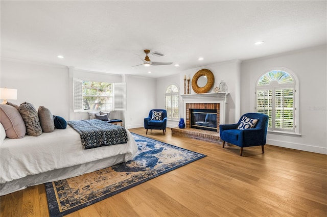 101 Ponce De Leon Blvd, Belleair, FL 33756 - bedroom featuring multiple windows, ornamental molding, visible vents, and wood finished floors