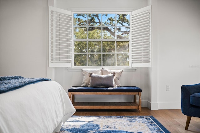 101 Ponce De Leon Blvd, Belleair, FL 33756 - bedroom featuring baseboards, multiple windows, and wood finished floors