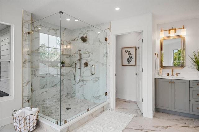 101 Ponce De Leon Blvd, Belleair, FL 33756 - bathroom with recessed lighting, baseboards, marble finish floor, vanity, and a marble finish shower