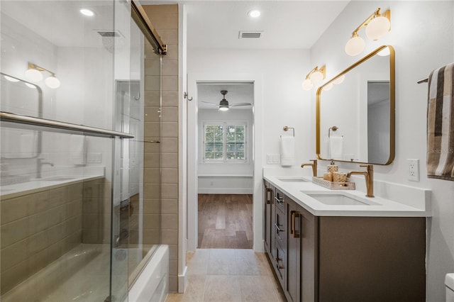 101 Ponce De Leon Blvd, Belleair, FL 33756 - full bathroom featuring double vanity, visible vents, ceiling fan, and a sink
