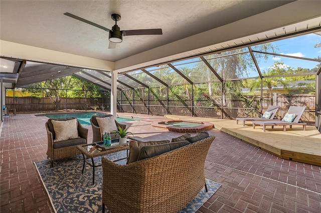 101 Ponce De Leon Blvd, Belleair, FL 33756 - view of patio featuring a ceiling fan, an in ground hot tub, a fenced in pool, and a fenced backyard