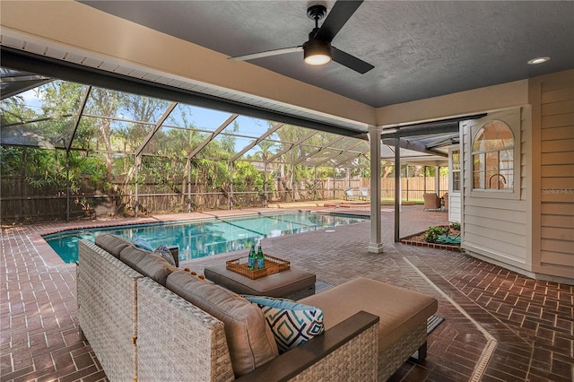 101 Ponce De Leon Blvd, Belleair, FL 33756 - view of swimming pool with a fenced in pool, ceiling fan, a patio area, glass enclosure, and a fenced backyard