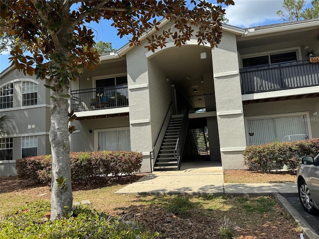 3705 SW 27th St Unit 214, Gainesville, FL 32608 - view of property with stairway